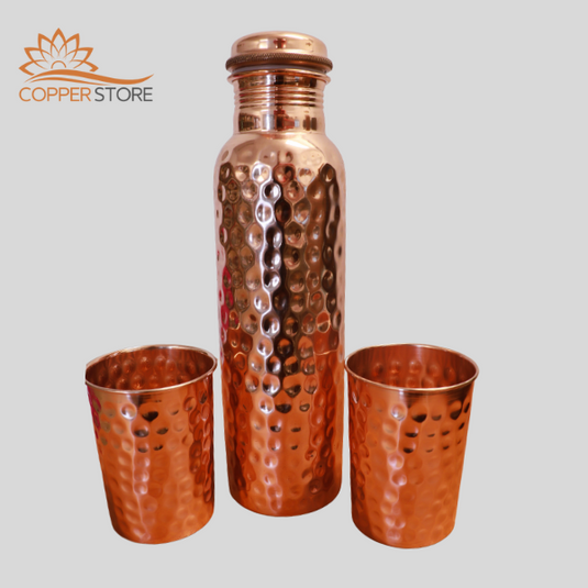 Hammered copper bottle glass set