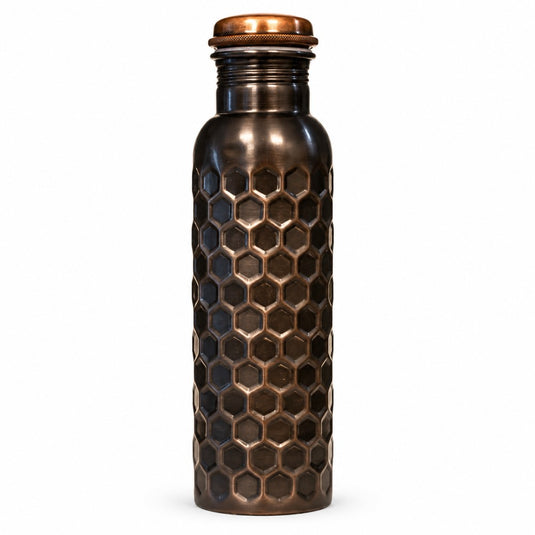 Bronze water bottle with hexagonal pattern on a white background