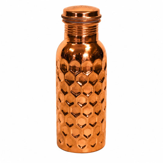Copper water bottle with honeycomb pattern on a white background