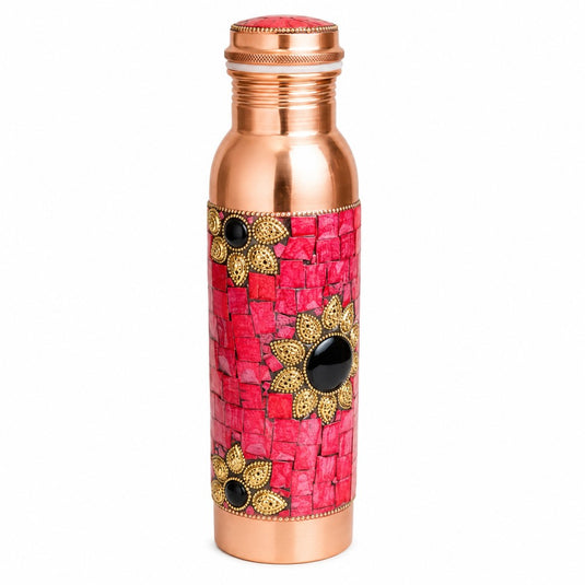 Decorative copper water bottle with pink mosaic design on a white background